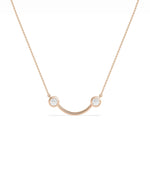 2 Stone Smile Necklace side angle displaying joyful silhouette detail
