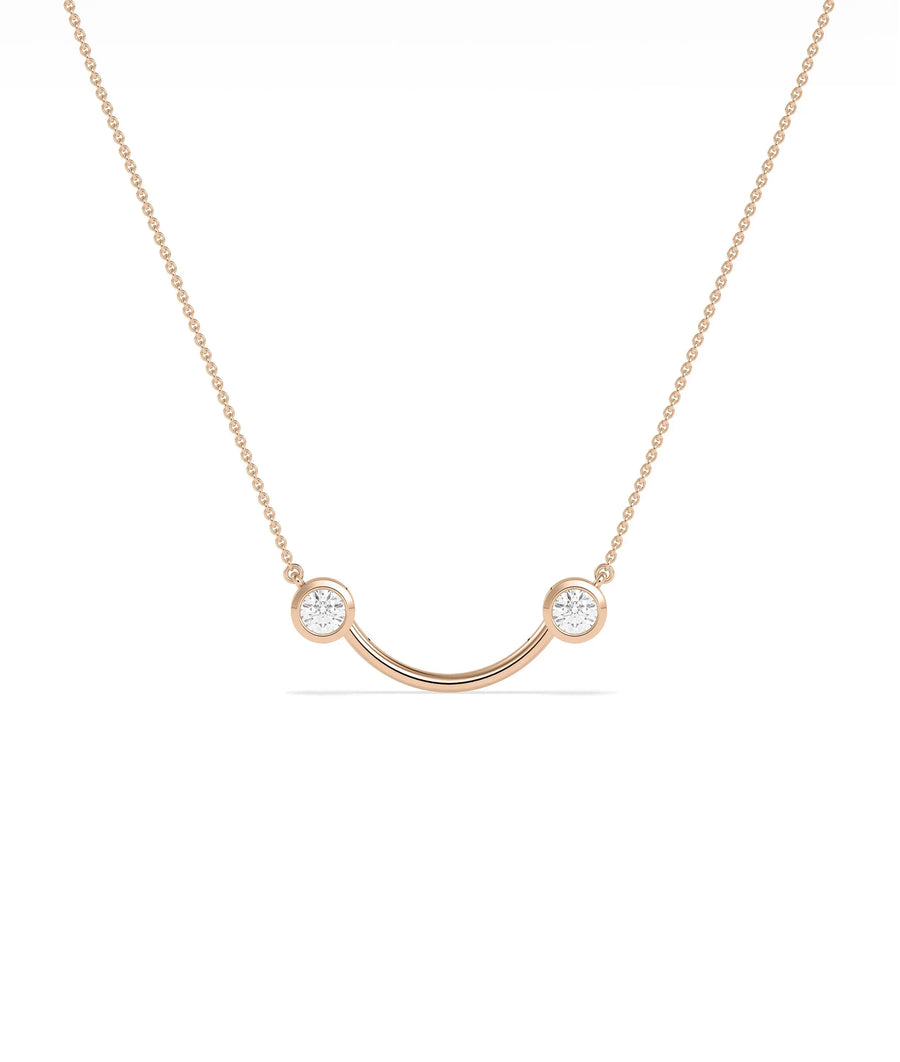 2 Stone Smile Necklace side angle displaying joyful silhouette detail