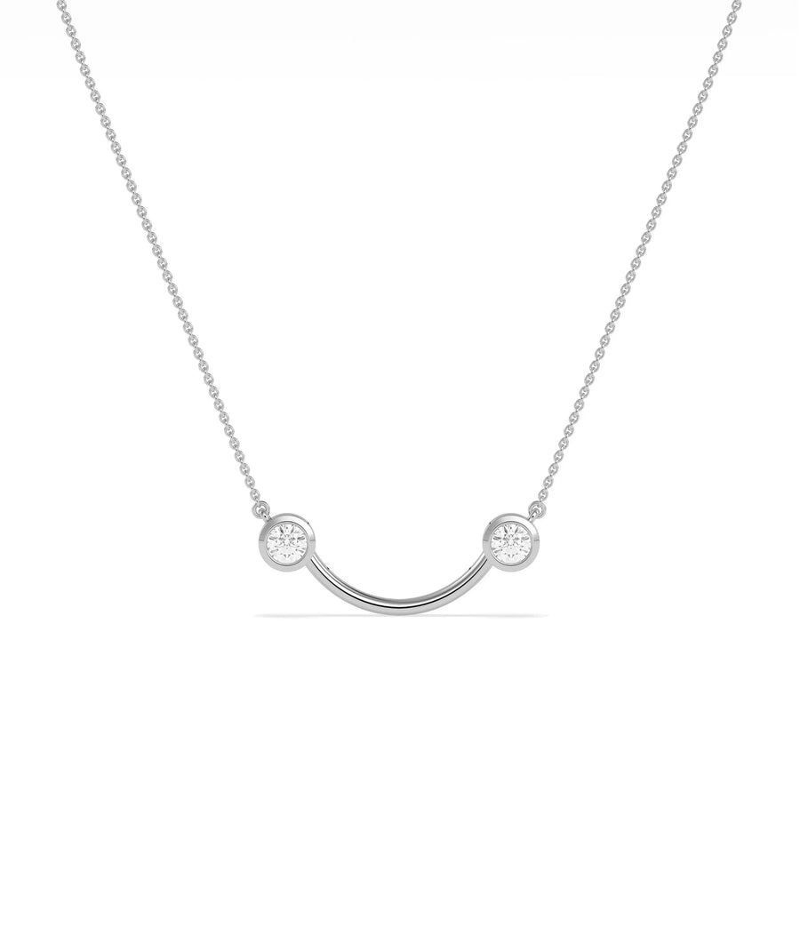 Smile pendant necklace showing curved design with two diamond accents