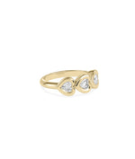 Three heart diamond ring showing bubble bezel frames and romantic design