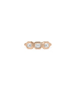 Emerald cut diamond band ring close up of bubble setting and step cut facets