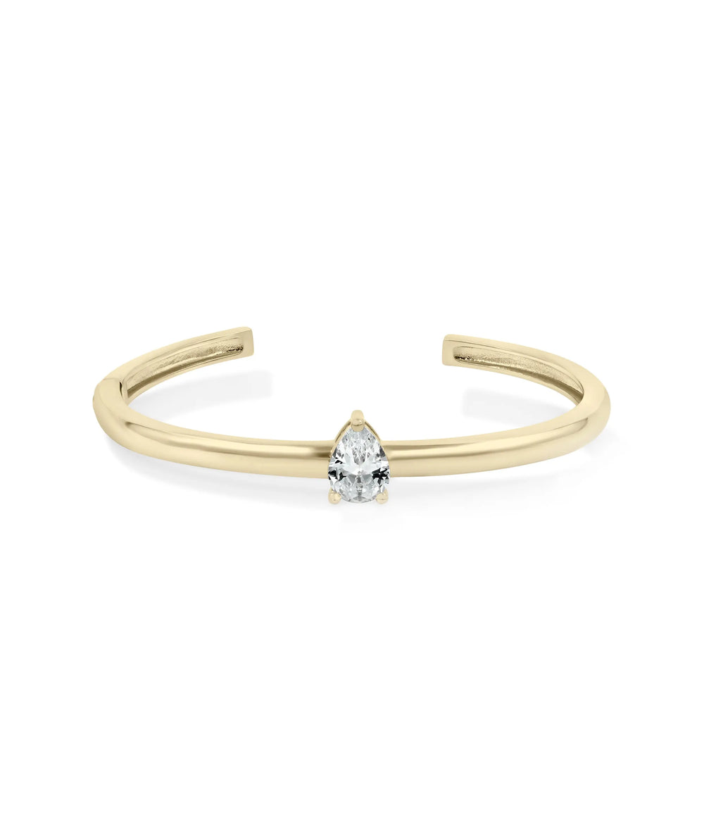 Solitaire Cuff Bangle front view yellow gold with prominent focal diamond