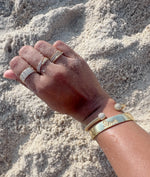 Pyramid design ring on hand highlighting comfortable wearable stackable styling