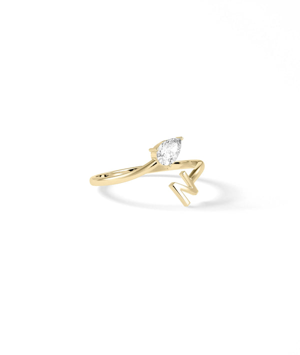 Side view of Solitaire Bypass Initial Ring highlighting initial and diamond alternate view
