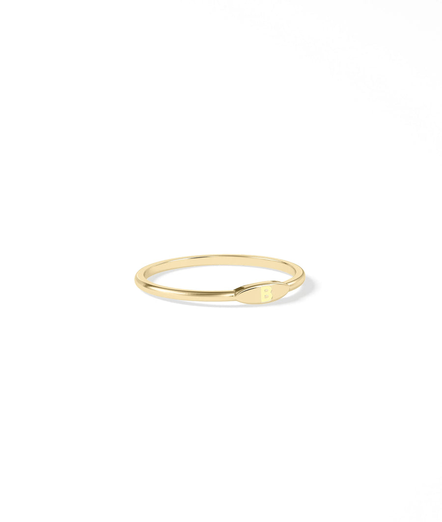 Side view of Embossed Single Initial Petite Ring highlighting raised initial