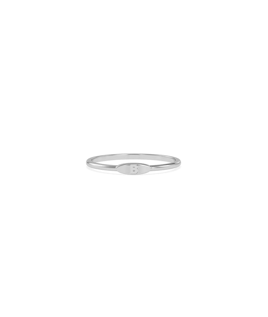 Close-up of Embossed Single Initial Petite Ring showing dimensional embossing