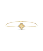 Fluted Clover Bracelet front view yellow gold with diamond clover charm
