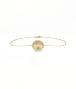Fluted Circle Bracelet front view yellow gold with diamond circle charm