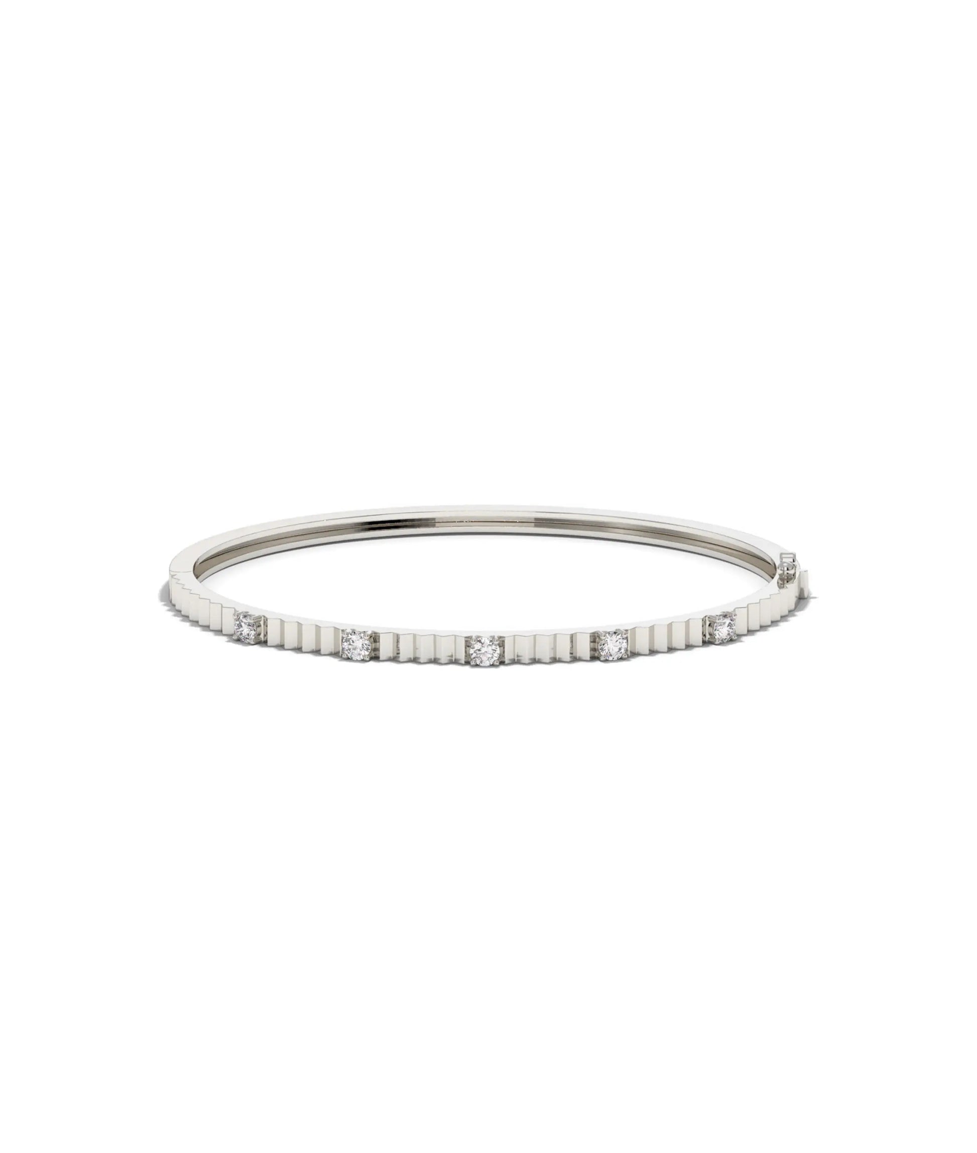 White gold fluted station diamond bangle with elegant rhythmic diamond pattern