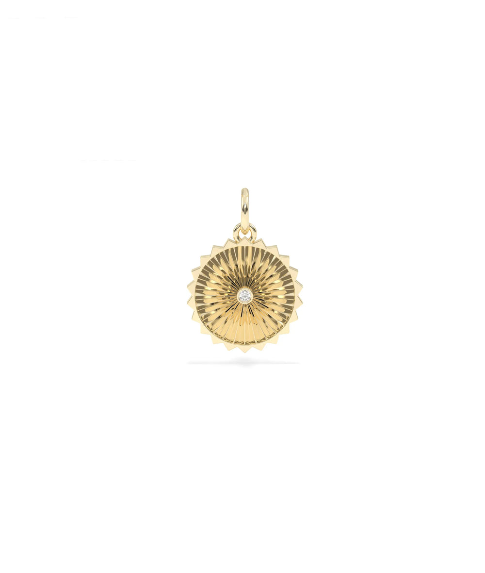 Fluted circle charm front view in yellow gold with minimalist textured design