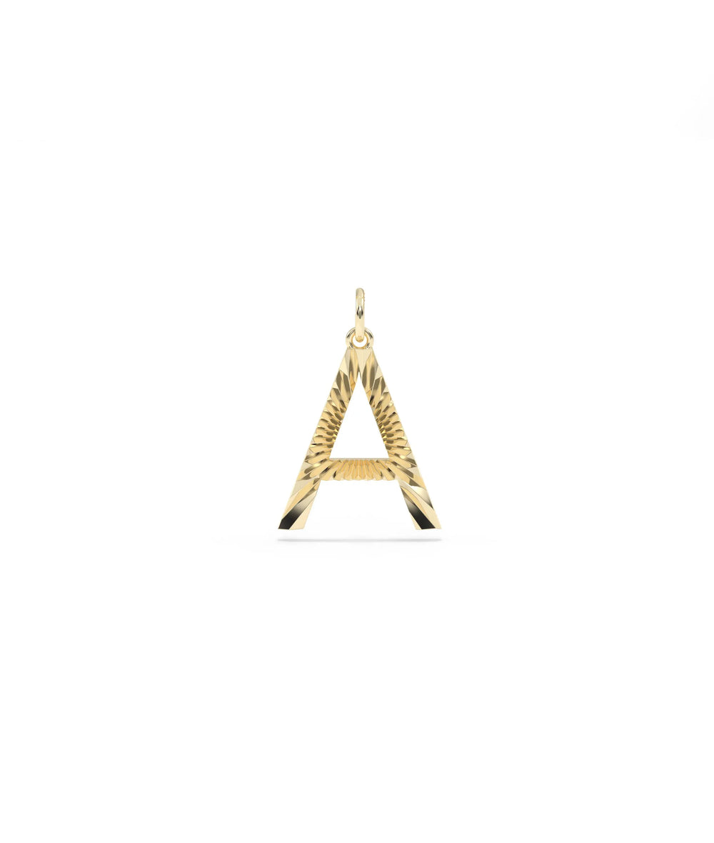 Fluted initial charm front view in yellow gold with textured letter design
