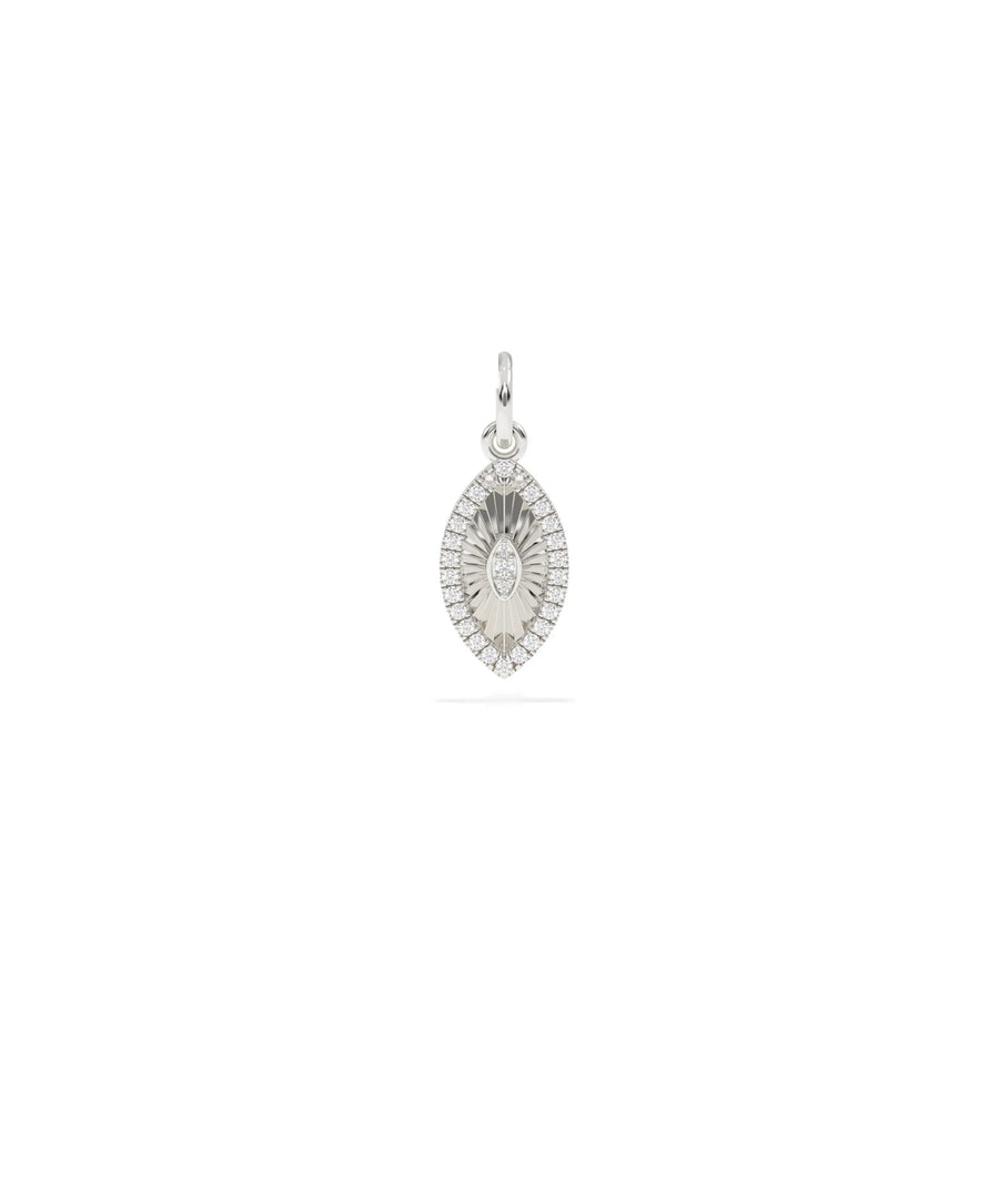 White gold fluted evil eye charm with spiritual symbol and fluted texture