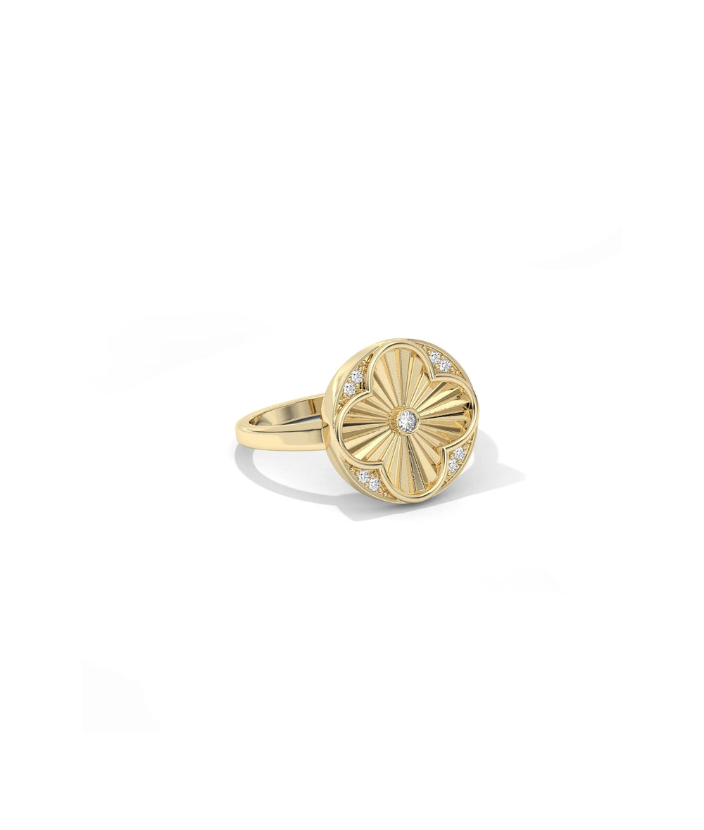 Side angle fluted clover diamond ring showing textured grooves and diamond detail