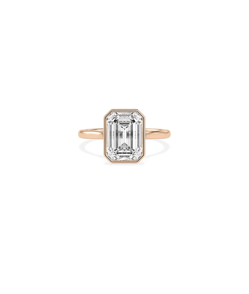 Solitaire Bezel Set Ring detail emphasizing solid gold craftsmanship quality