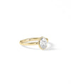 Four prong diamond ring showing secure setting and brilliant center stone