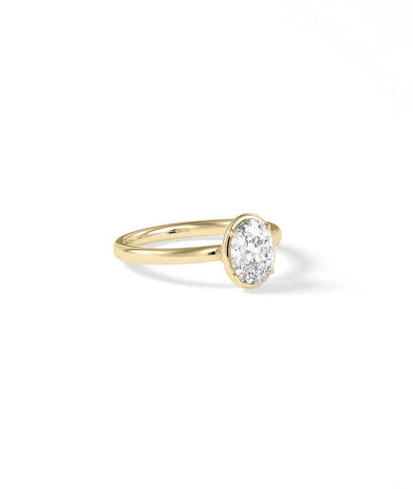 Four prong diamond ring showing secure setting and brilliant center stone alternate view