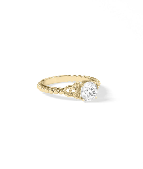 Filigree diamond ring showing vintage inspired ornate metalwork and center stone alternate view