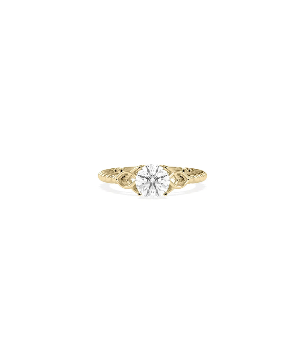 Solitaire Round Filigree Design Ring with diamond and intricate gold detailing