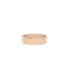 Gold Name Band Ring stacked with other rings showing versatile styling