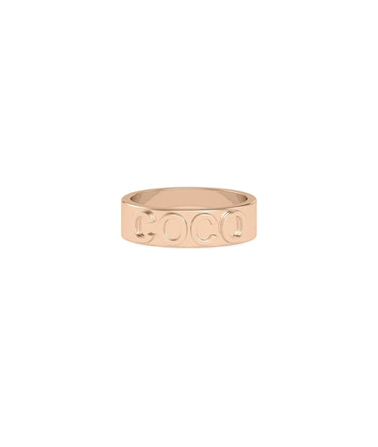 Gold Name Band Ring stacked with other rings showing versatile styling