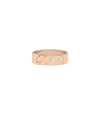 Gold Name Band Ring stacked with other rings showing versatile styling
