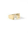 Statement diamond initial ring showing sparkle and oversized letter design