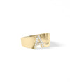 Statement diamond initial ring showing sparkle and oversized letter design