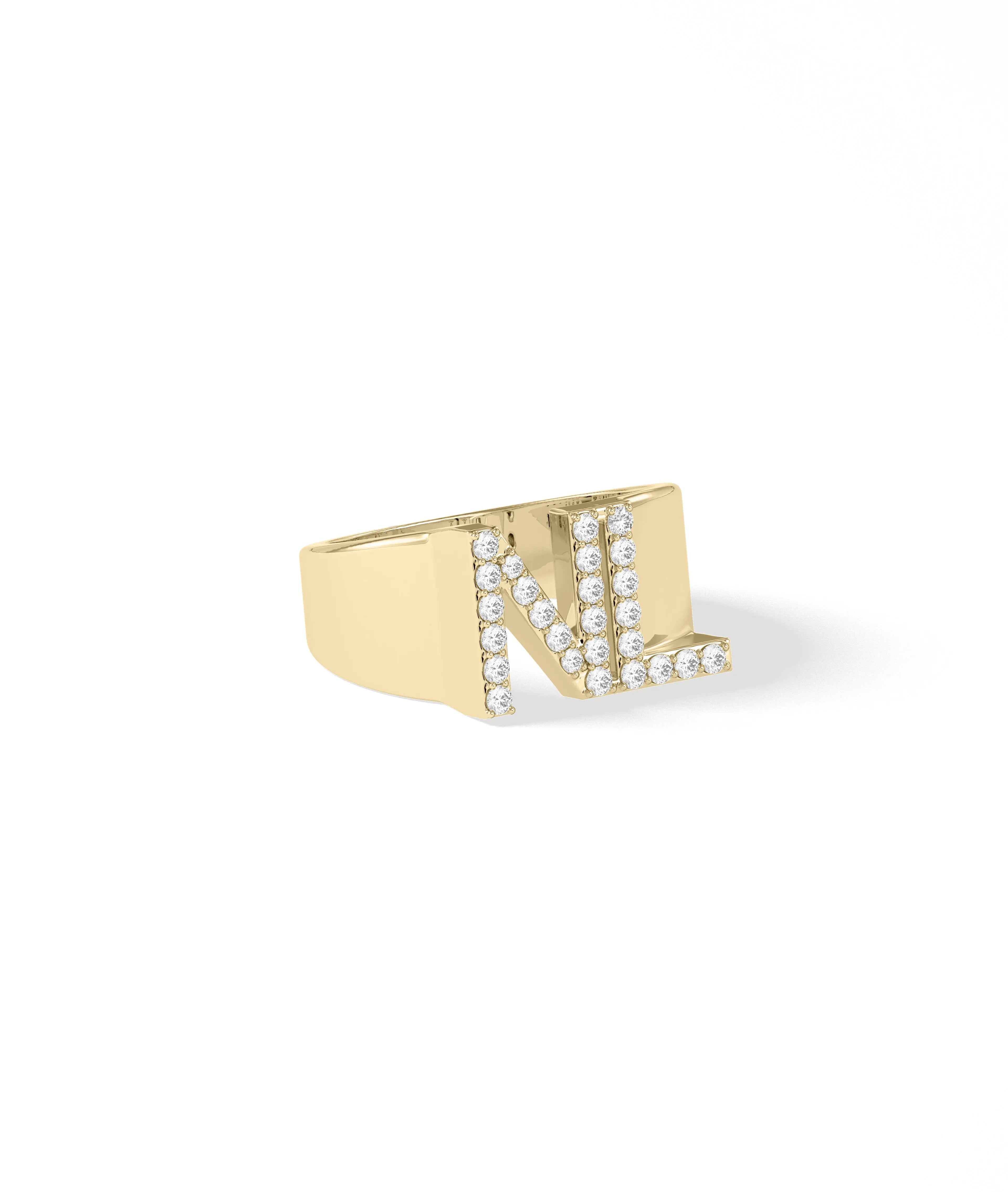 Luxury diamond initial ring showing extensive sparkle and oversized design