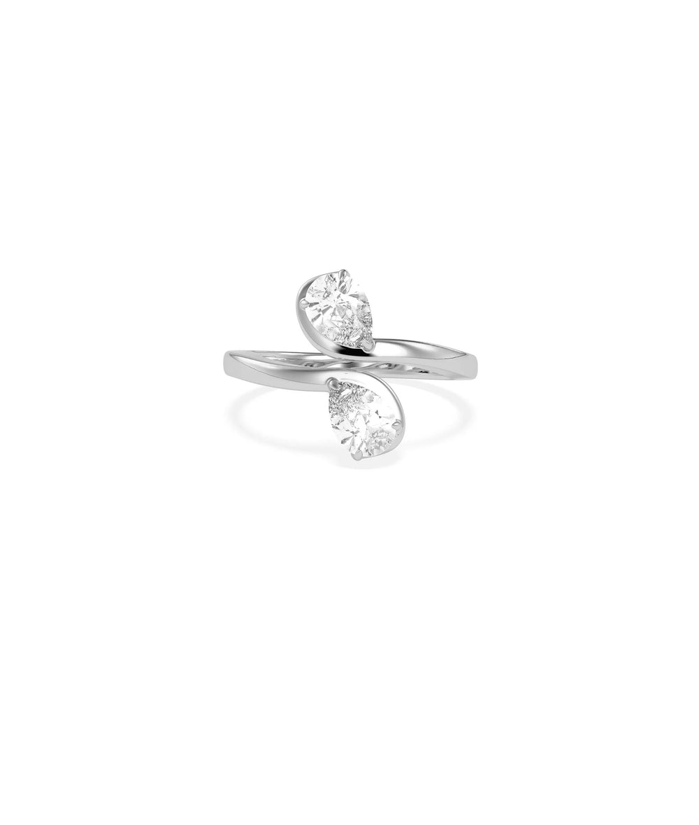 Solitaire Bypass Ring on hand displaying elegant crossing silhouette