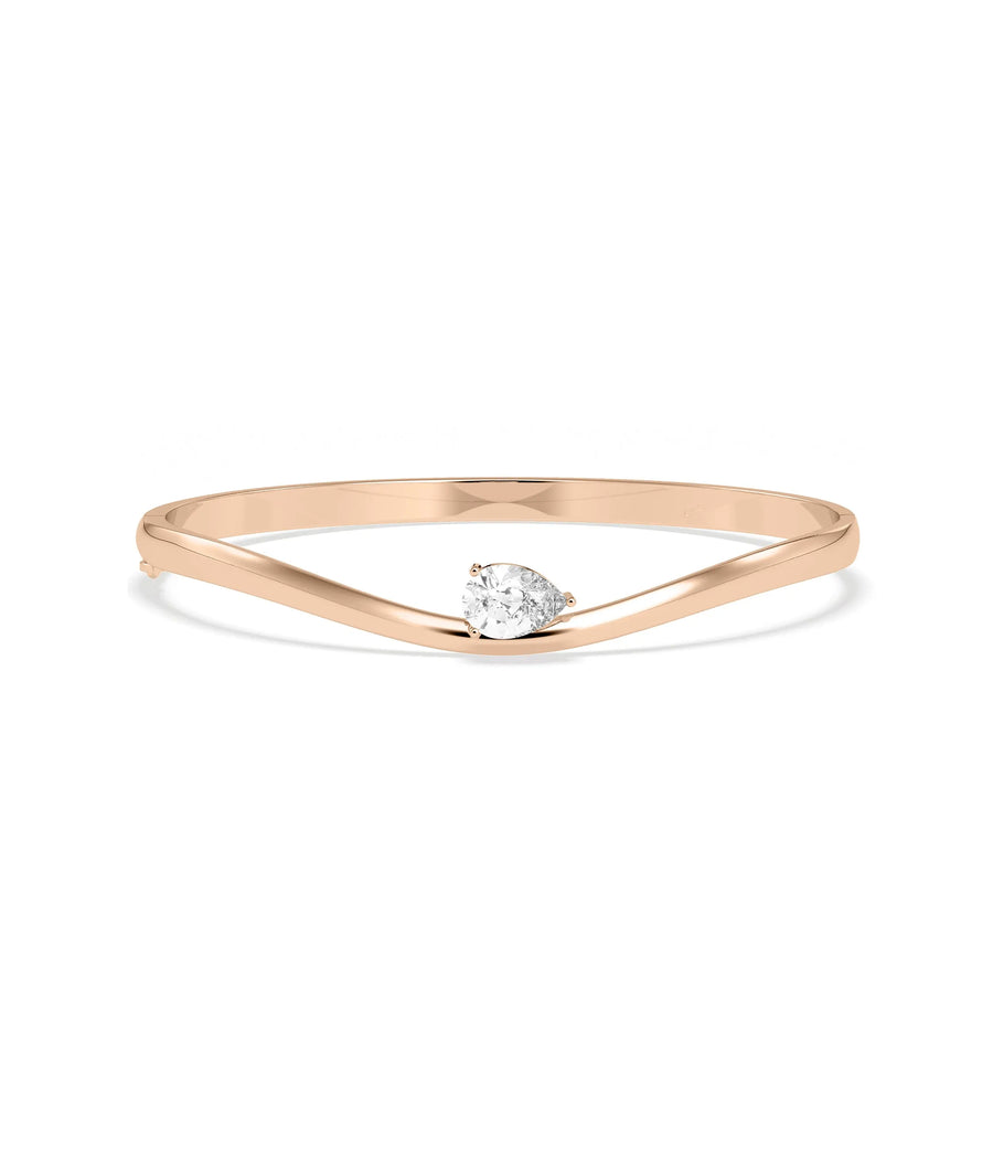 Side profile of Solitaire Wave Bangle highlighting dimensional wave texture