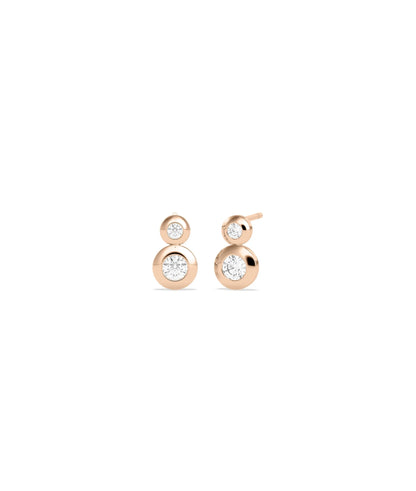 2 Stone Bezel Set Stud Earrings worn on ear displaying low profile design