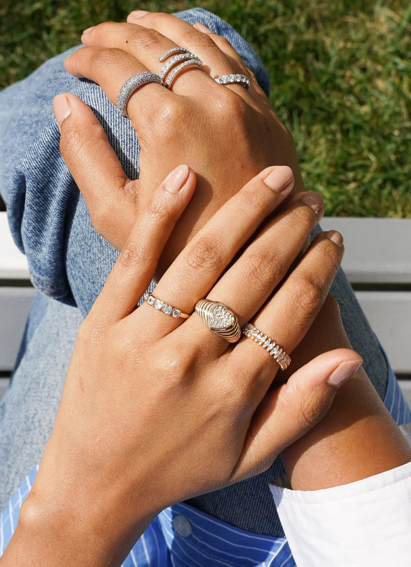 Multi Shape Diamond Band Ring on hand displaying mixed-cut sparkle