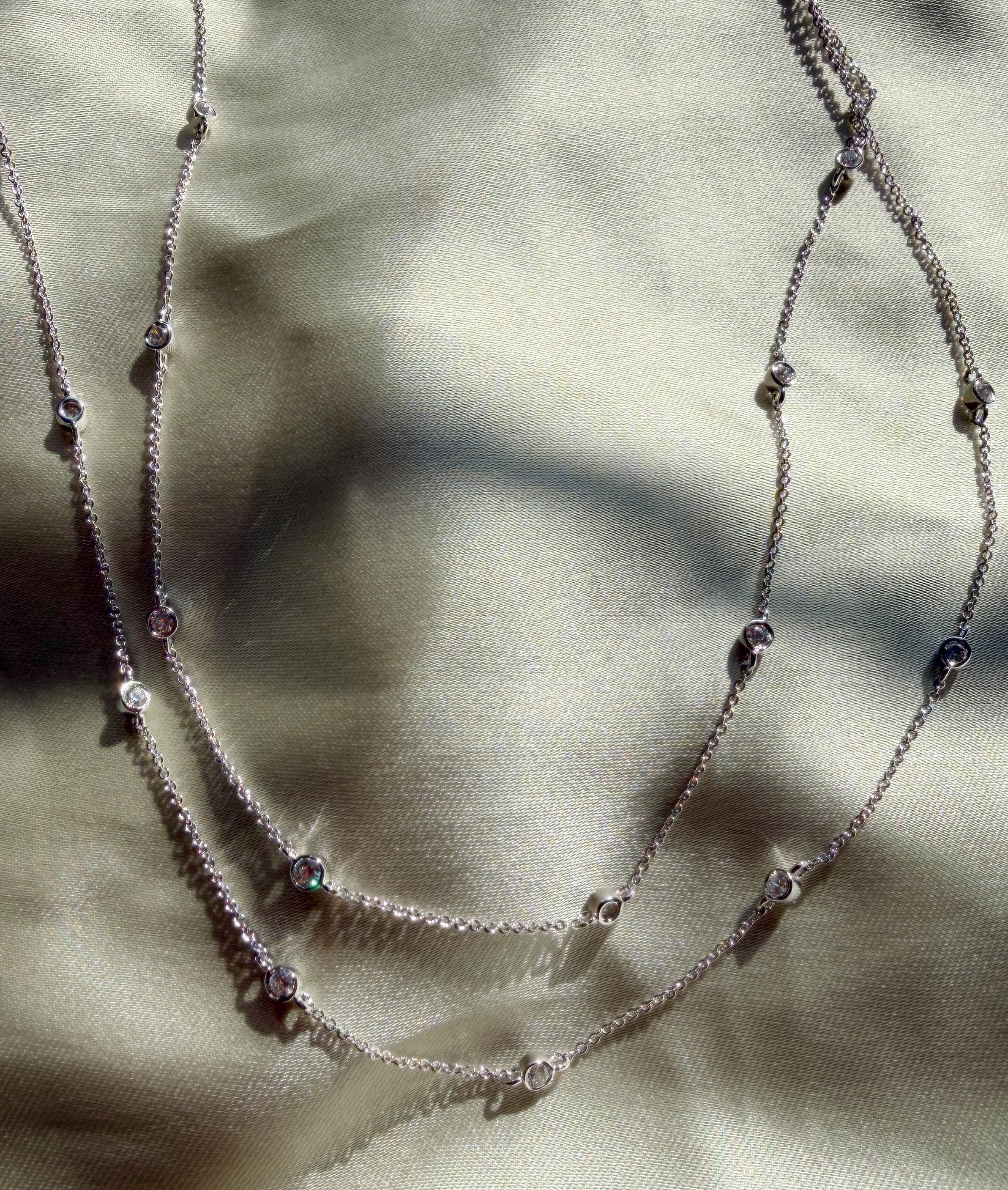 Layered bezel diamonds 0.65 ctw nearly two-thirds carat close-up