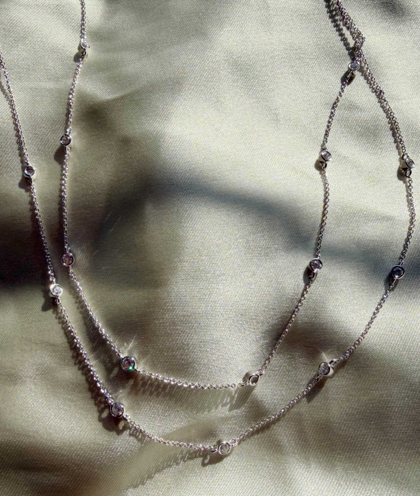 Layered bezel diamonds 0.65 ctw nearly two-thirds carat close-up