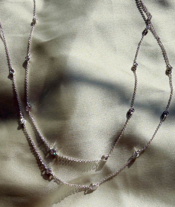 Layered bezel diamonds 0.65 ctw nearly two-thirds carat close-up alternate view