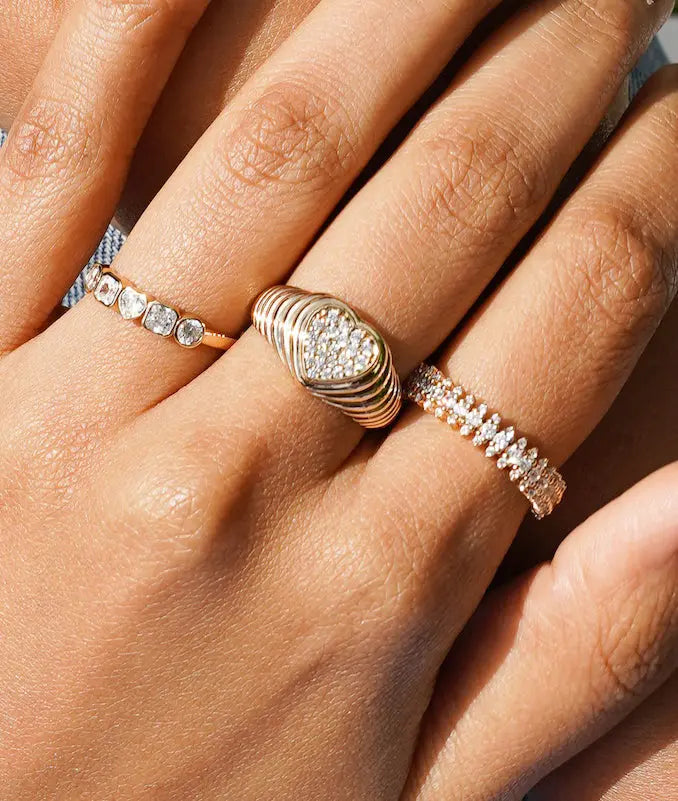 Heart Shape Signet Waterfall Ring on hand displaying playful romantic design