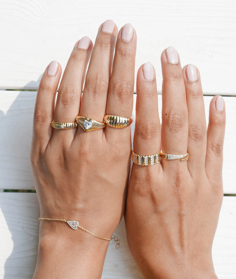 Fluted Dome Band Ring on finger capturing architectural texture and commanding statement width