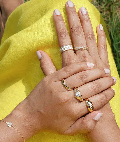 Diamond Station Fluted Band Ring on finger capturing architectural grooves and diamond brilliance