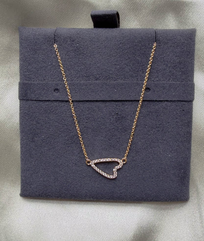 Abstract heart outline diamonds 13x8mm 0.13 ctw modern close-up