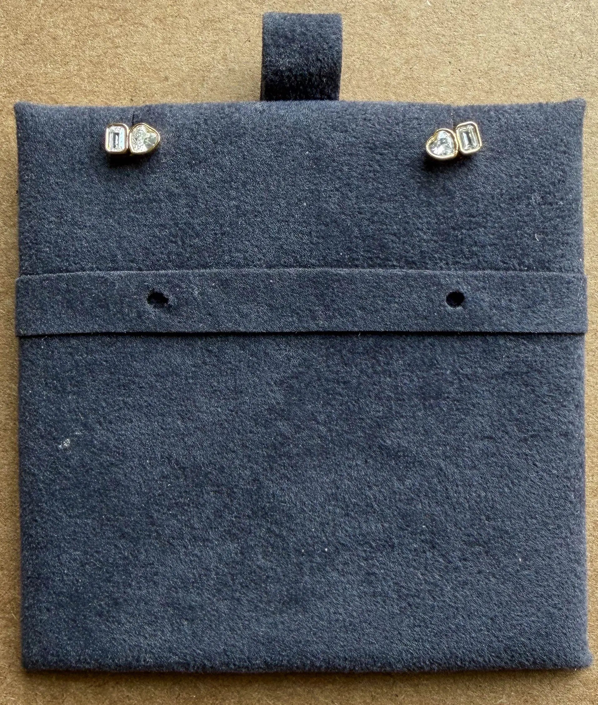 Dual diamond studs lifestyle shot showcasing everyday elegant touch of class style