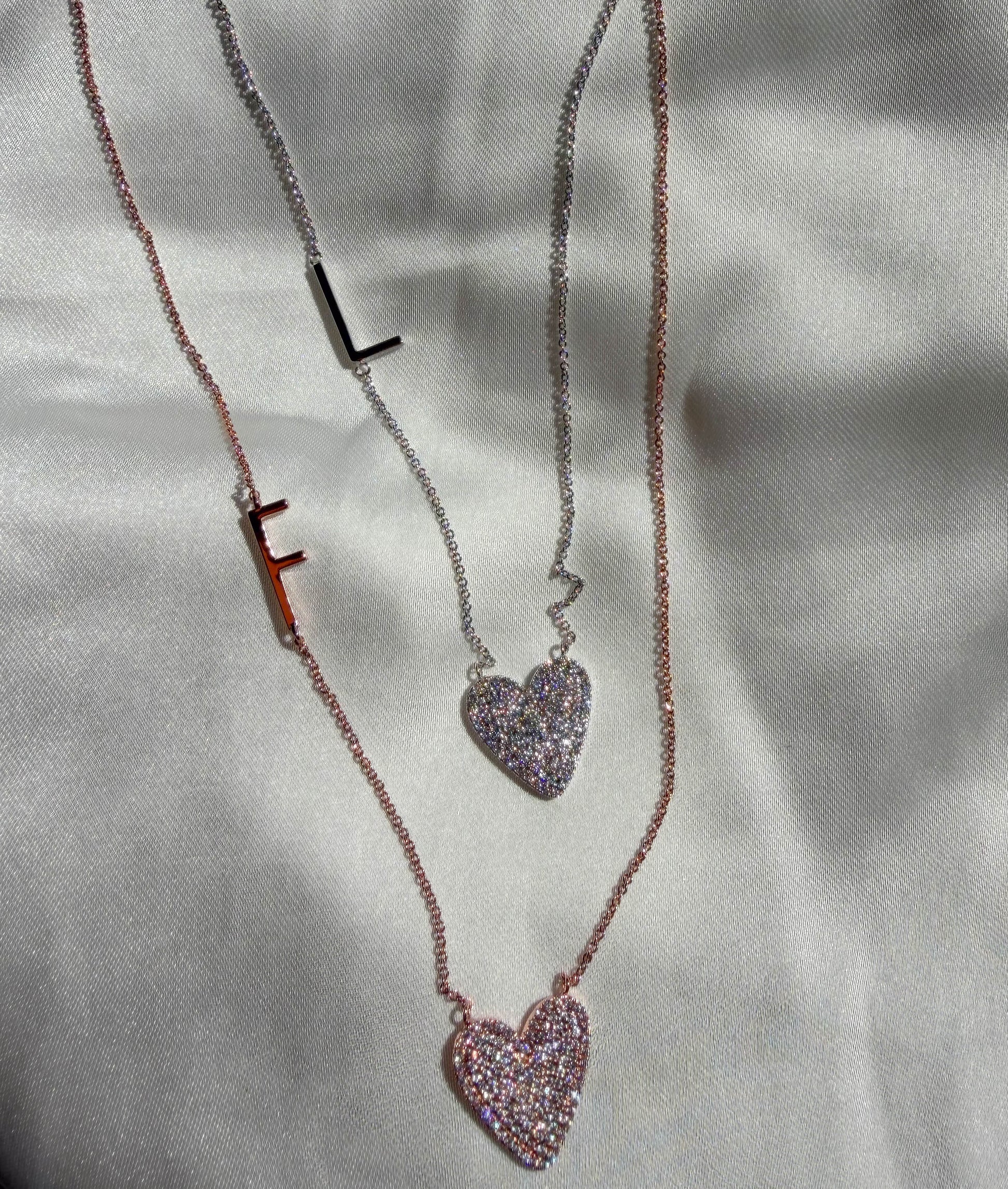 Sunken heart diamonds initial 16mm 15mm 0.47 ctw close-up