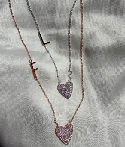 Sunken heart diamonds initial 16mm 15mm 0.47 ctw close-up