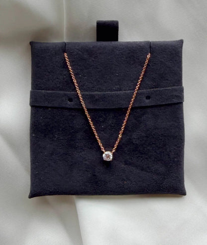 Solitaire Diamond Necklace worn on model, elegant everyday jewelry styling