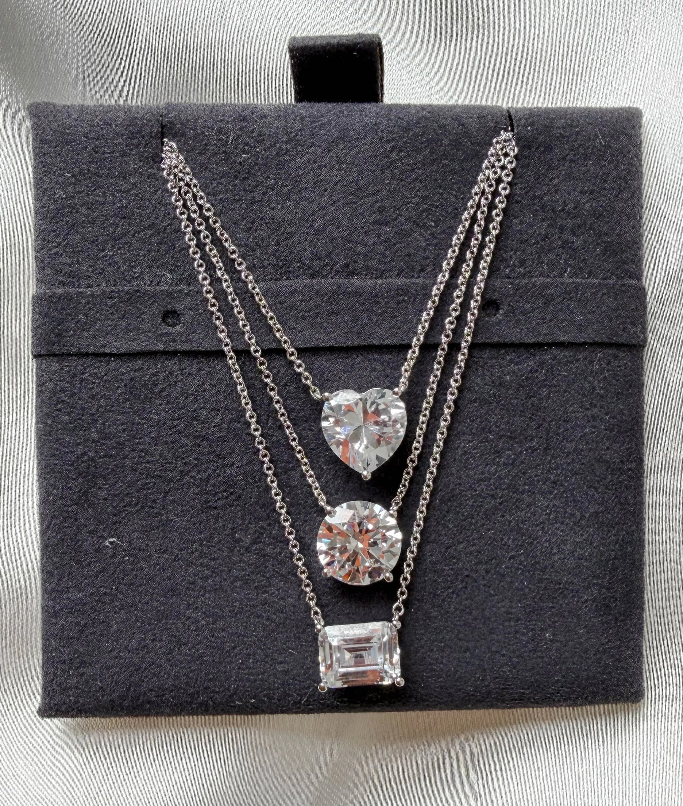 Solitaire Diamond Necklace side angle, brilliant cut diamond pendant detail