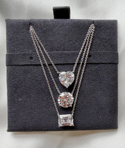 Solitaire Diamond Necklace side angle, brilliant cut diamond pendant detail