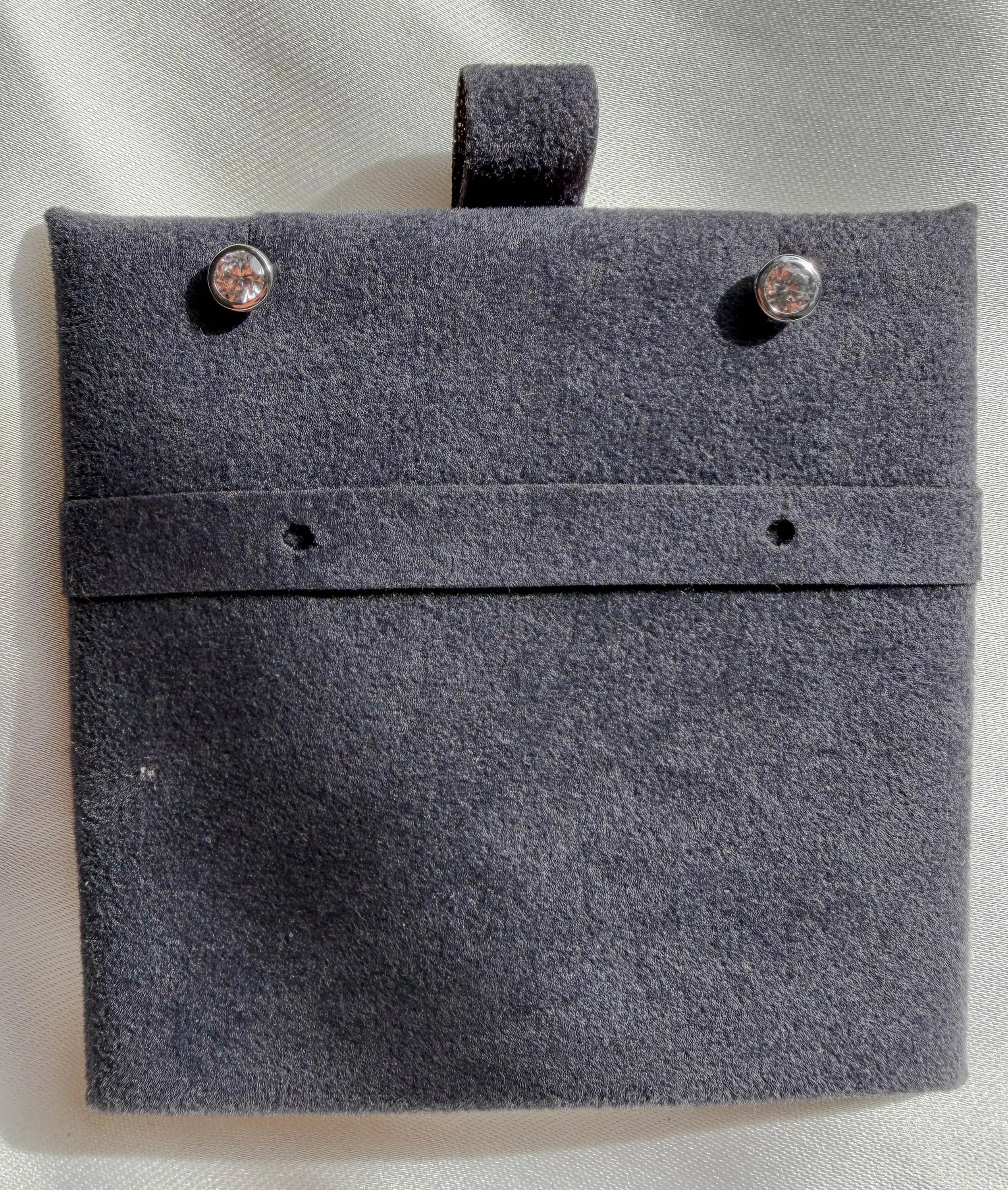 Martini stud earrings showing bezel setting and cone shaped post design