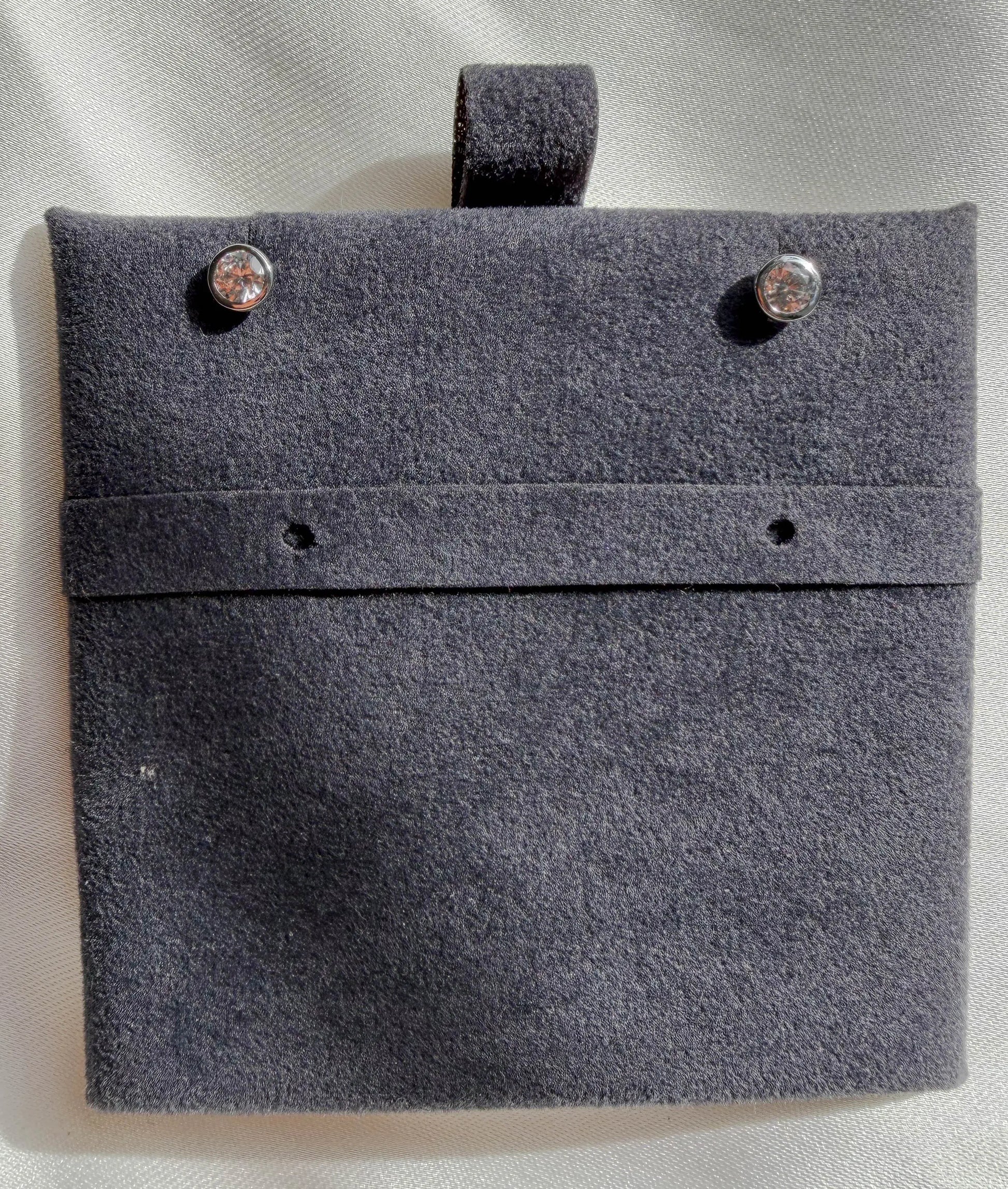 Martini stud earrings showing bezel setting and cone shaped post design