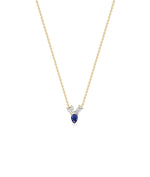 Multi shape 3 stone solitaire necklace in 14K yellow gold with blue sapphire