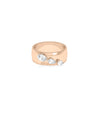 Wide rose gold band ring featuring three graduating pear-cut diamonds set in prongs along the front face.