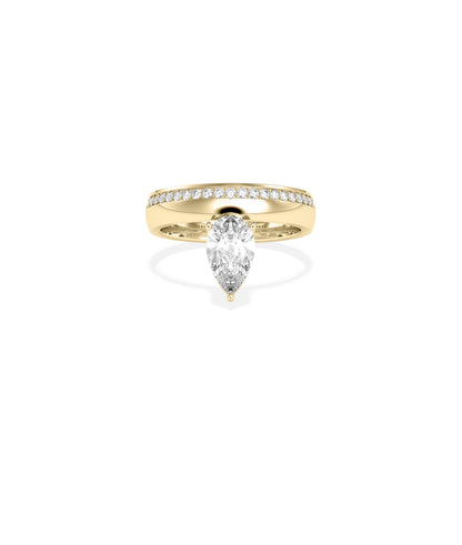Pear-cut diamond solitaire engagement ring in yellow gold with pavé diamond band, front view